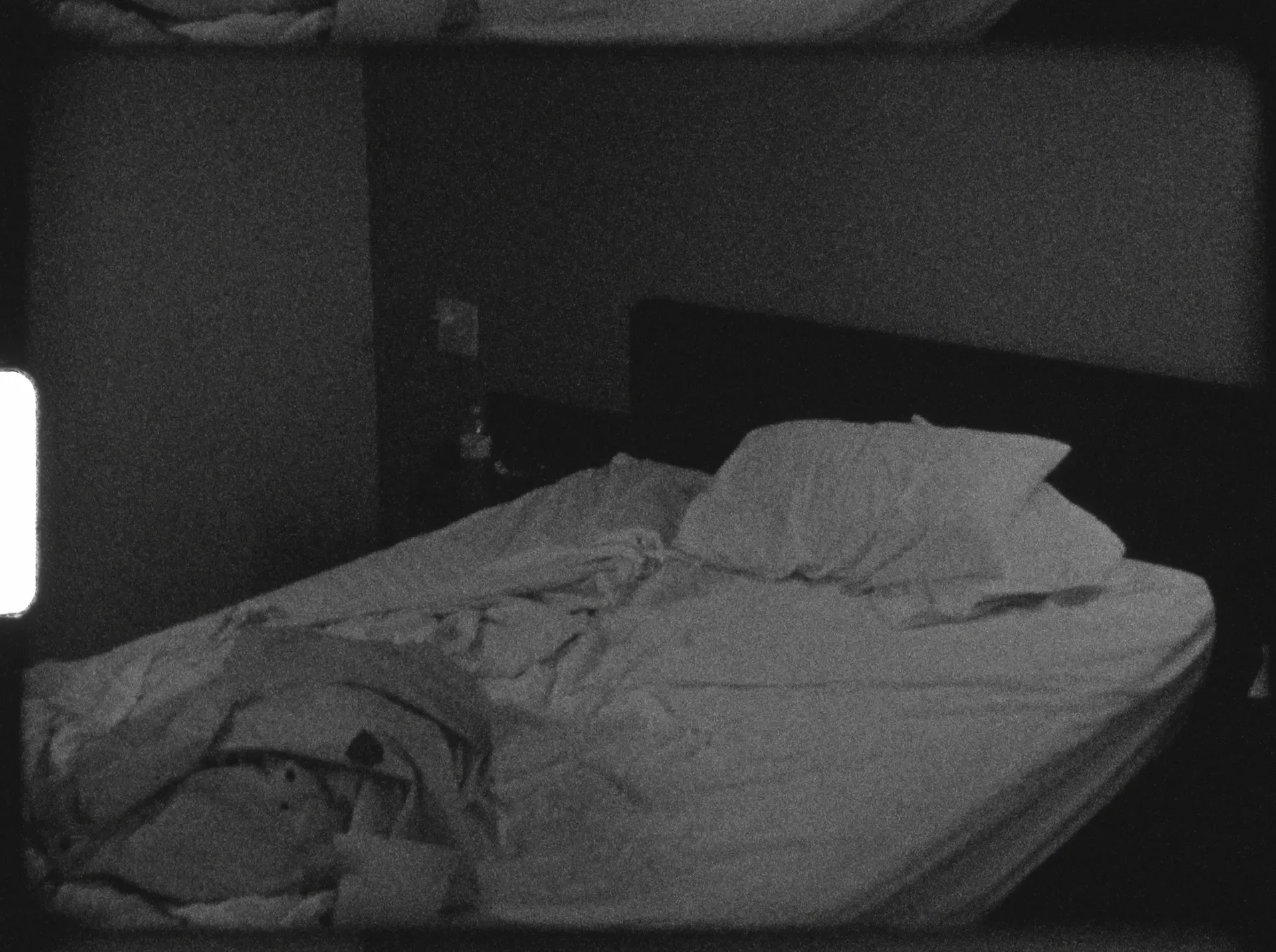 A motel bed in Baltimore